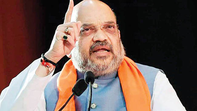union-home-minister-shri-amit-shah-delivers-a-speech-on-national-security-at-a-former-civil-servants-forum-in-new-delhi