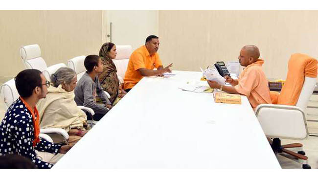 UP CM Adityanath meets Kamlesh Tiwari's family