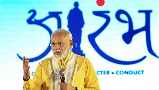 Work together, not in silos, PM tells IAS officers