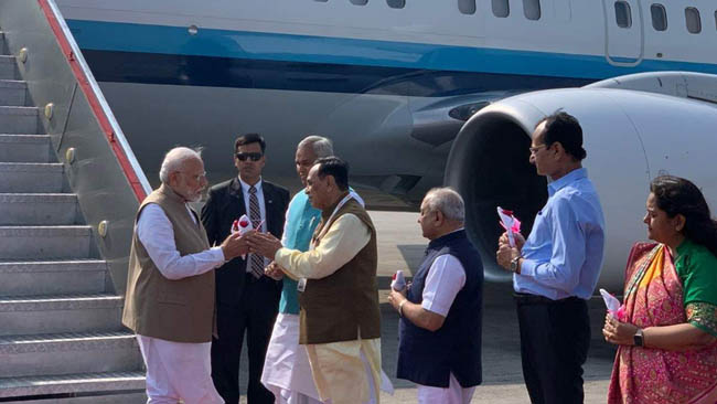 Modi arrives at Ahmedabad; to welcome Trump at airport