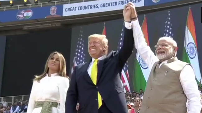 Thousands line up to greet Trump, Modi during roadshow