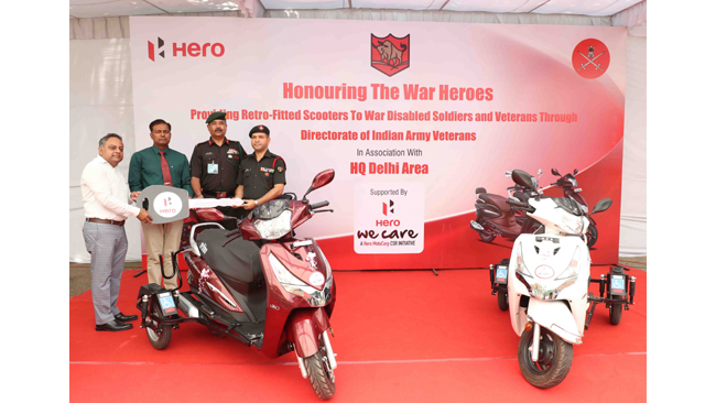 Hero MotoCorp hands over retro-fitted Hero Destini 125 scooters to the soldiers who were disabled while in service.